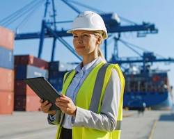 port engineer safety helmet inspection digital tablet container port photography